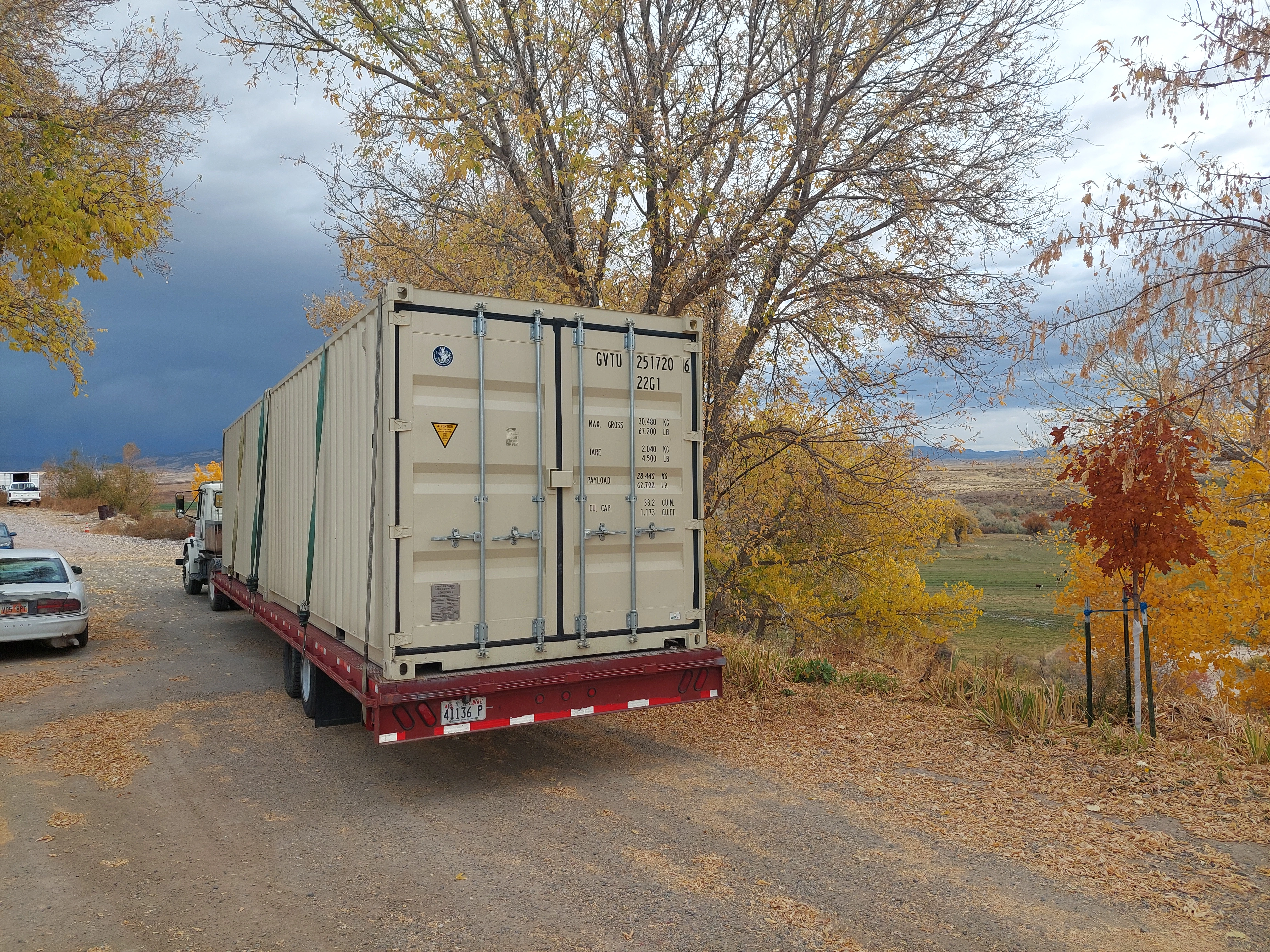 Fort Knox Self Storage delivering a steel shipping container in the Uintah Basin